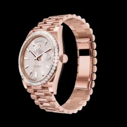 Rolex Day-Date: 40 Everose gold, with a sundust, diamond-set dial, diamond-set bezel and a President bracelet, m228345rbr-0007